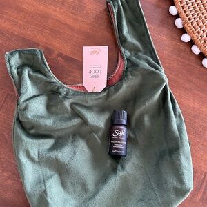 Saje Green makeup bag & House Warming Essential Oil Blend both NWT